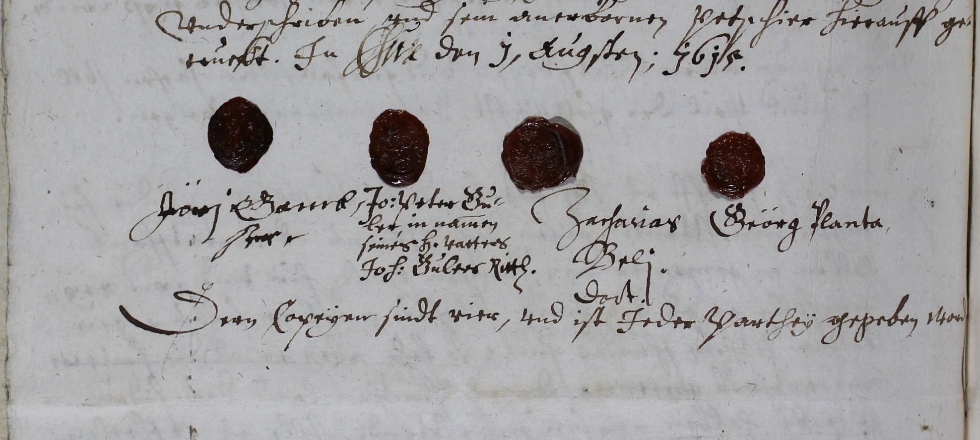 Ende einer alten handschriftlichen Urkunde. Vier Siegel mit Unterschriften.